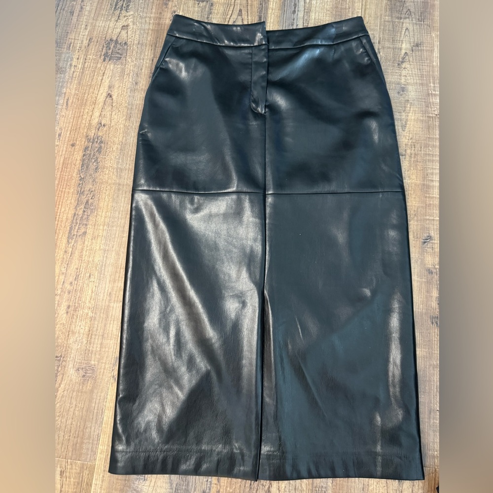 Charlie B faux leather black long skirt with front slit size 6